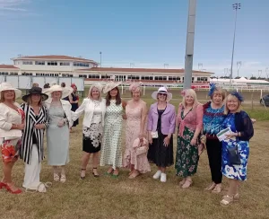 ladies day everyone on the grass before going in