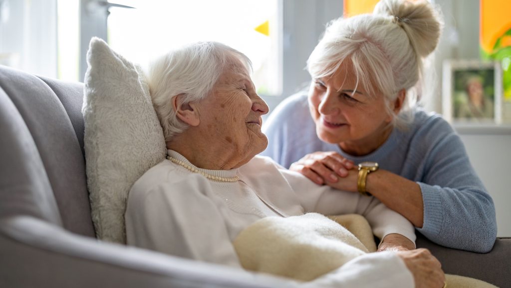 When should someone with dementia go into a care home