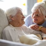 When should someone with dementia go into a care home