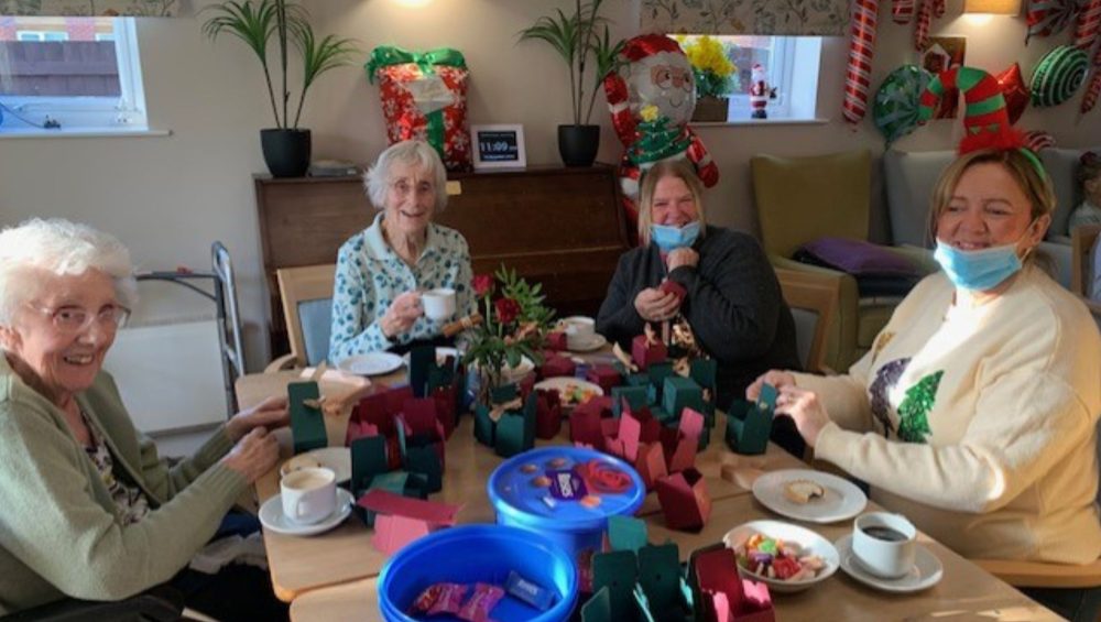 CRA Experian Staff Volunteer at Leawood Manor 1 Press release images collage templates 12